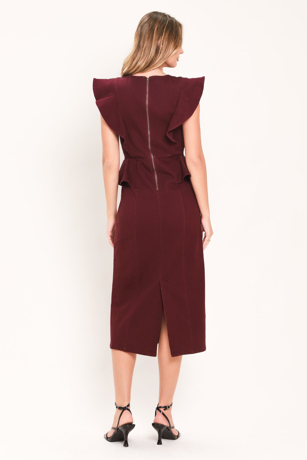Back view of burgundy midi dress with ruffle cap sleeves and center seam