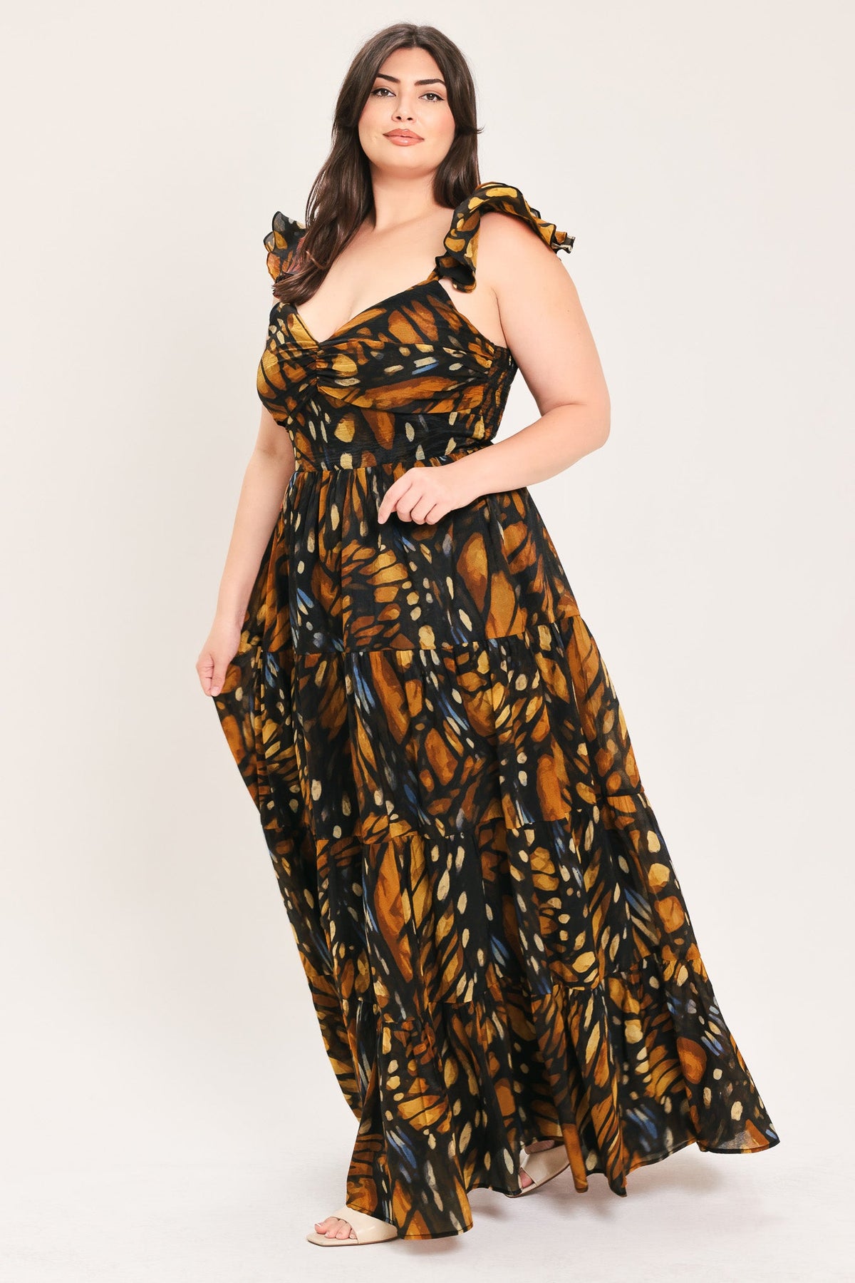 Black leaf-print woven maxi dress with square neckline and ruffle shoulder straps, gathered tiers