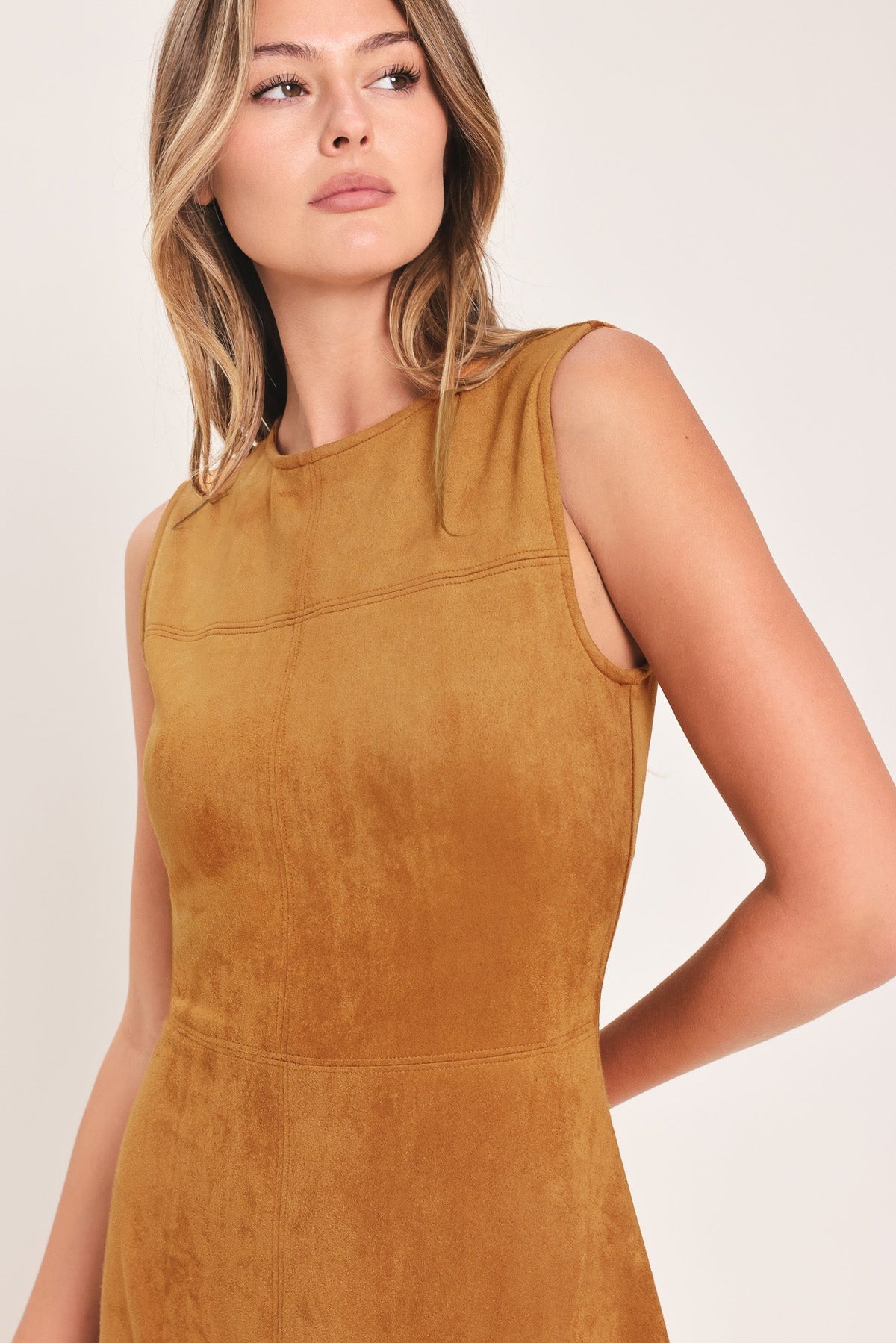 Camel faux suede sleeveless midi dress with high neckline and seam detail