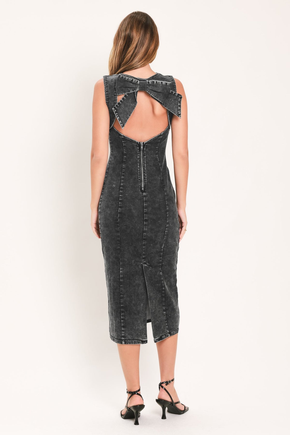Charcoal denim midi sheath dress with open back and oversized bow at waist