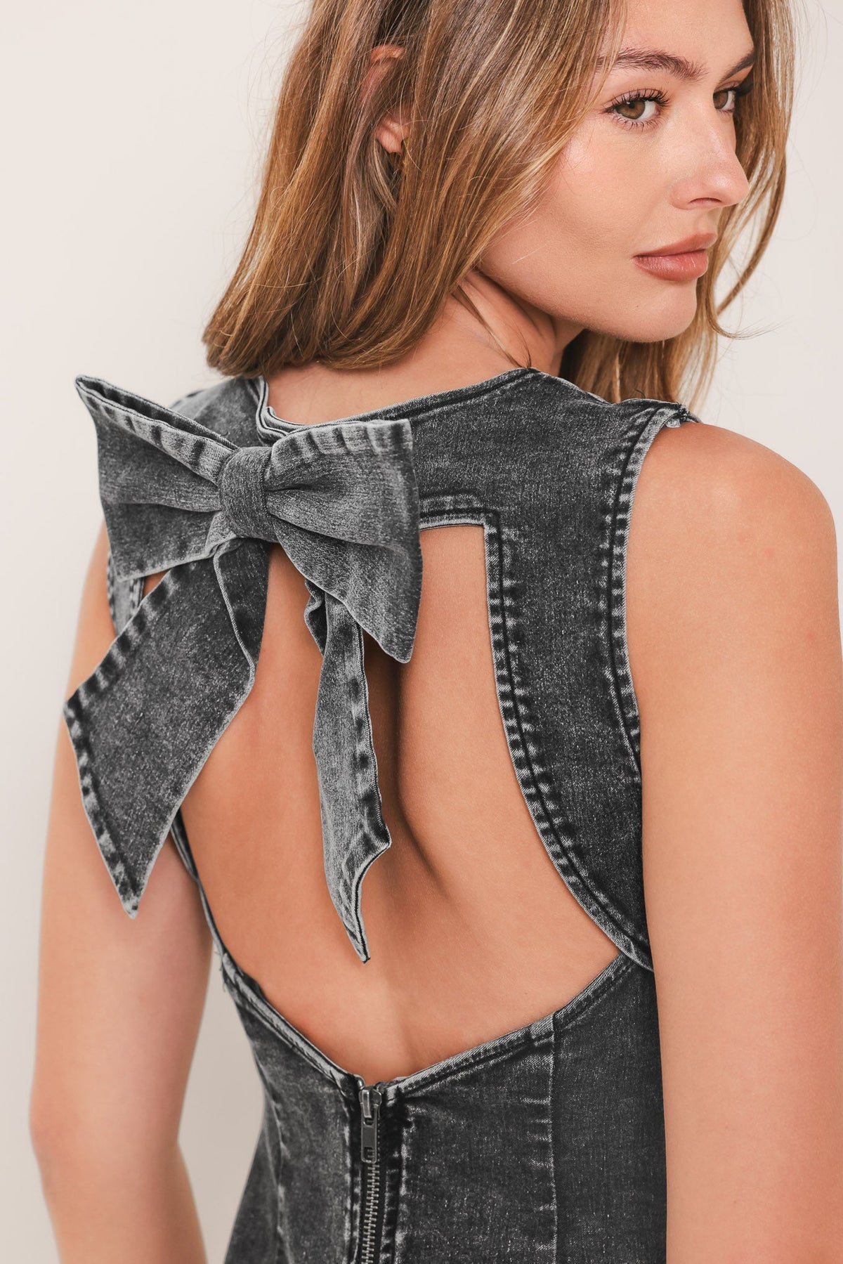 Charcoal denim midi sheath dress with open-back and bow tie detail