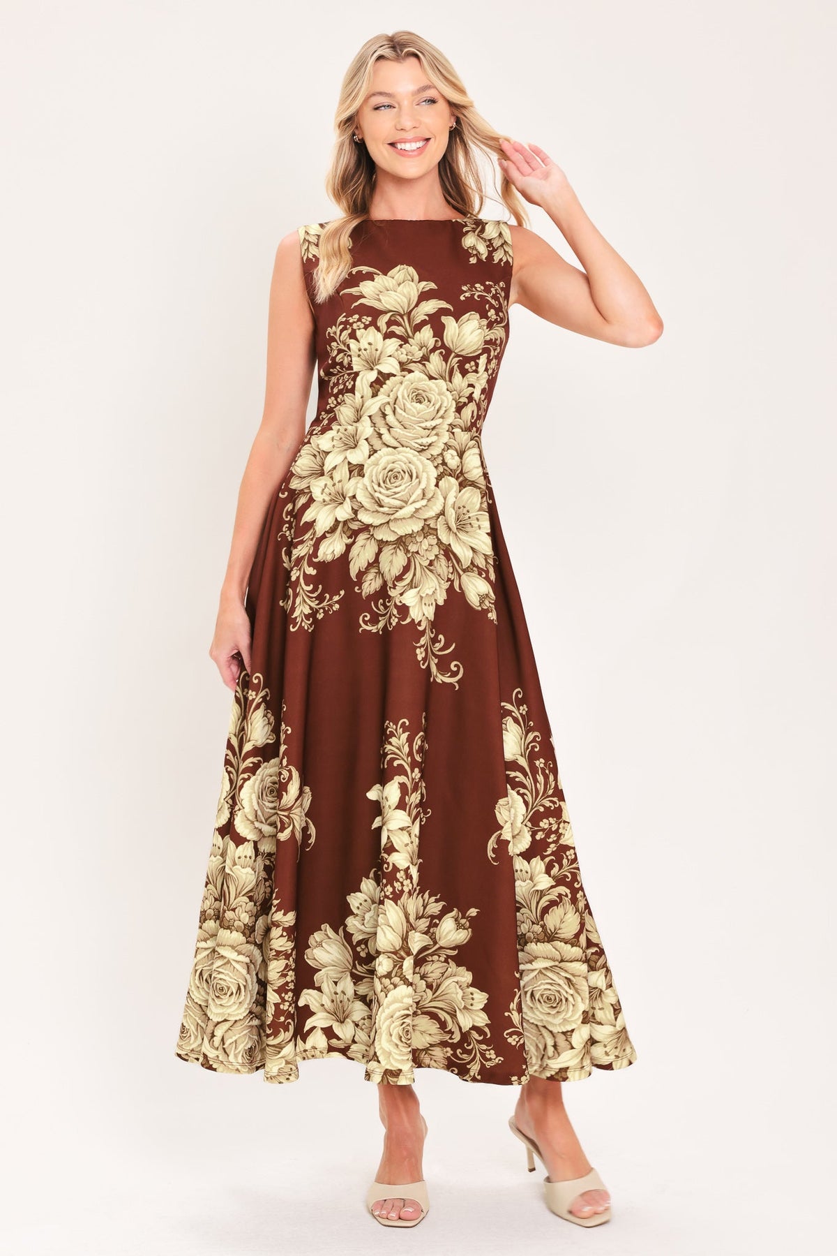 Burnt terracotta sleeveless midi dress with cream floral bouquet print and gathered skirt
