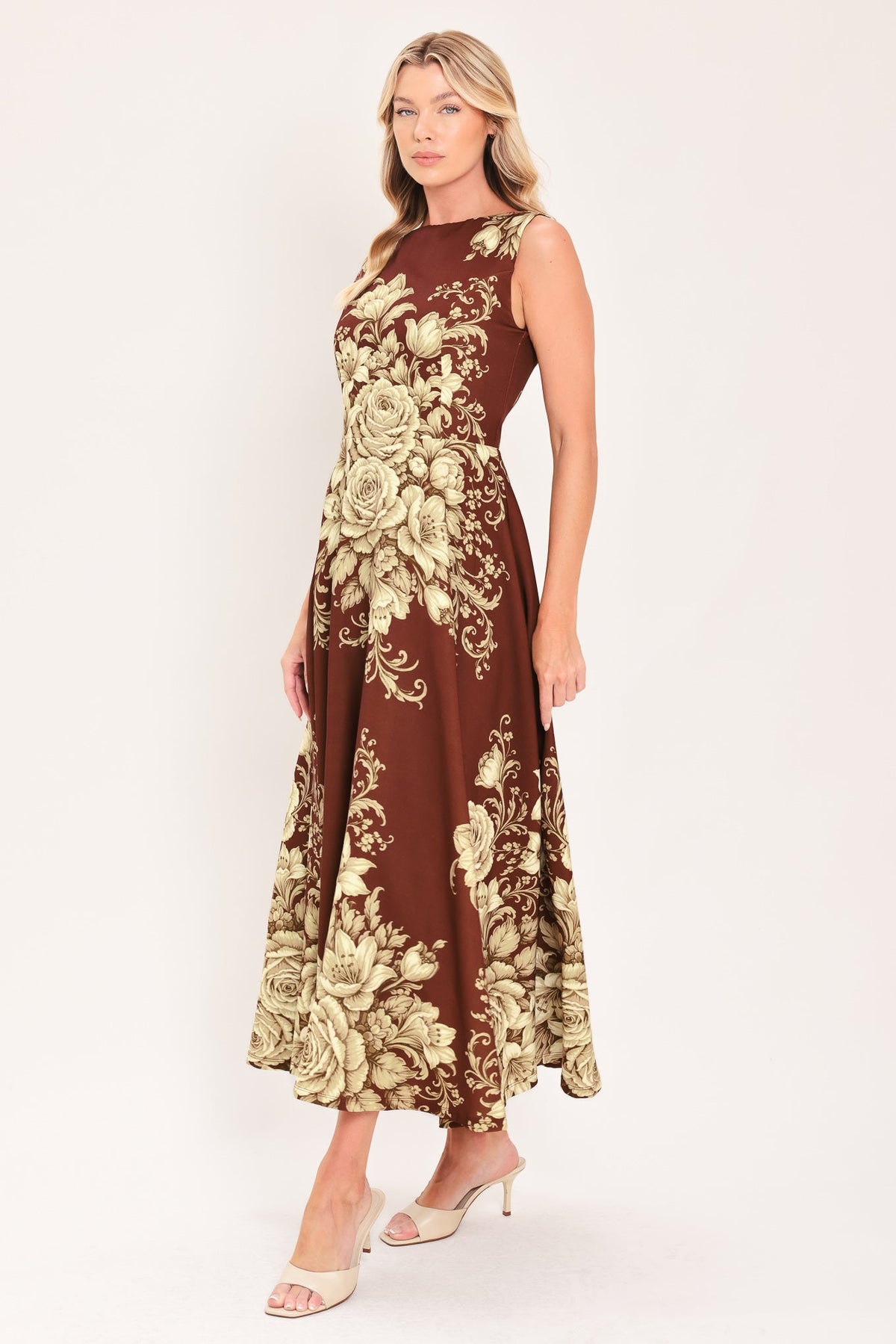 Burnt terracotta woven midi dress with ornate cream floral print, side profile full length