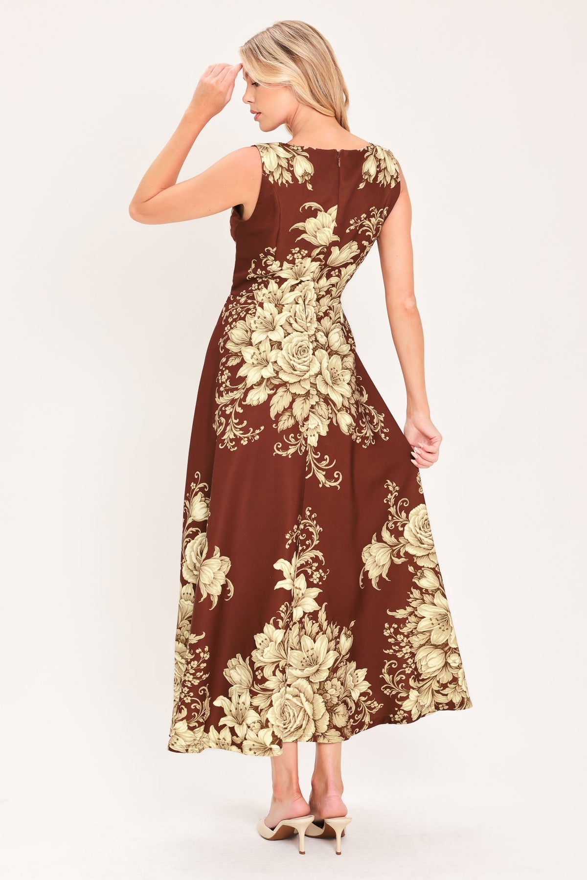 Back view of burnt terracotta woven midi dress with cream floral scroll pattern