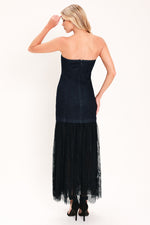 Dark indigo strapless denim tube dress back view with layered black tulle midi skirt