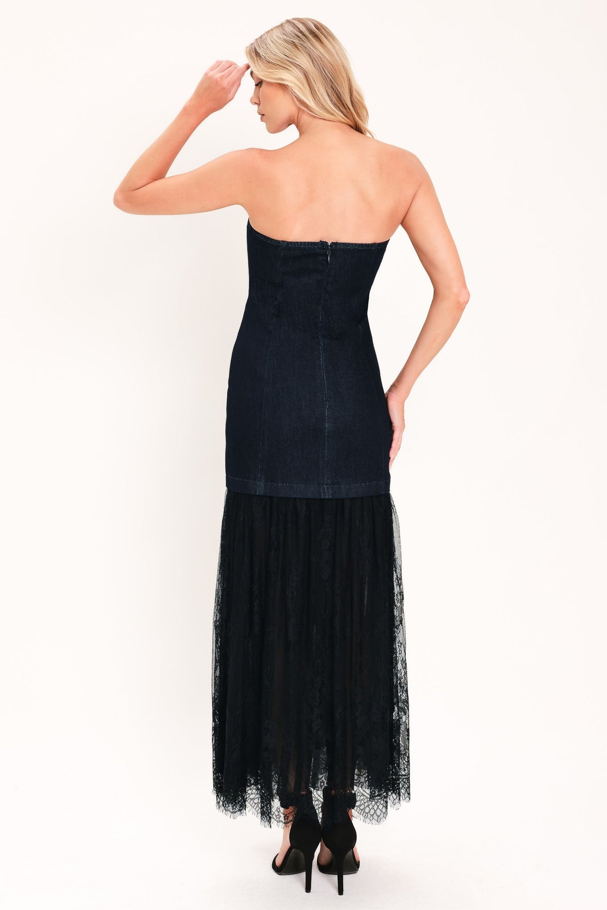 Dark indigo strapless denim tube dress back view with layered black tulle midi skirt