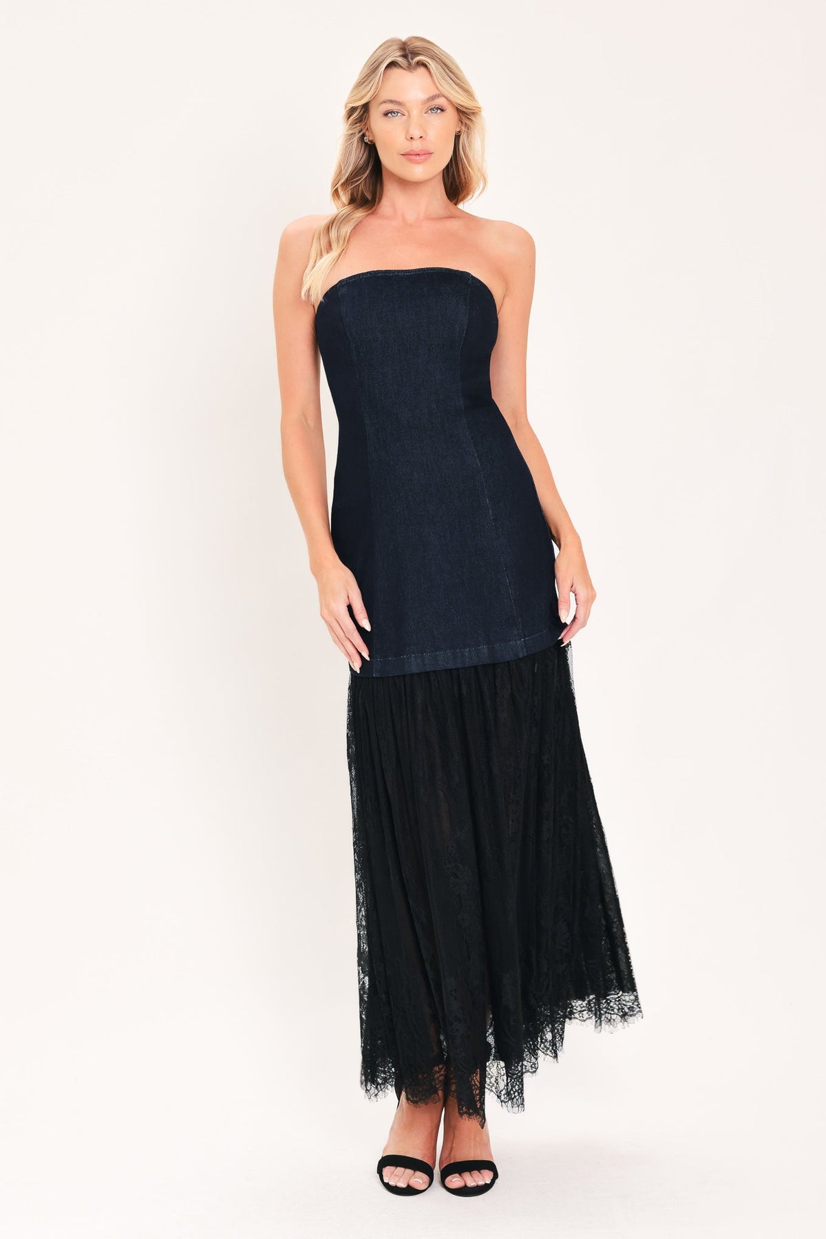 Dark indigo denim strapless tube midi dress with layered black tulle hem and heels