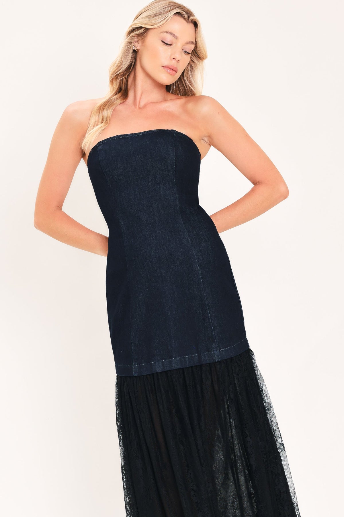 Dark indigo strapless denim tube bodice with fitted shape and layered black tulle skirt