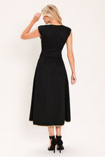 Black woven midi dress back view with fitted waist and flared skirt silhouette