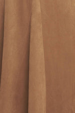 Camel faux suede fabric texture with vertical pleat lines