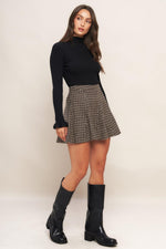 Hound flare tweed woven skirt, brown-and-black houndstooth weave, A-line pleats