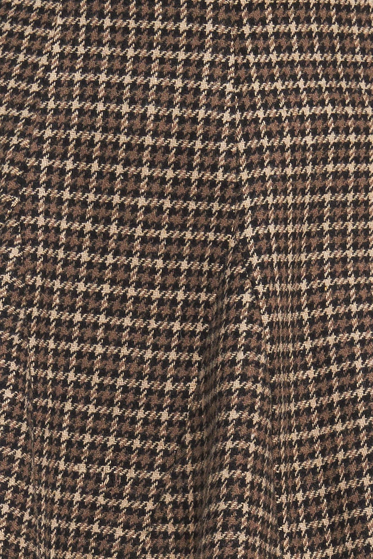 Hound flare tweed woven skirt fabric close-up, brown-and-black houndstooth weave