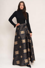 Black maxi circle skirt with woven gold floral lattice print