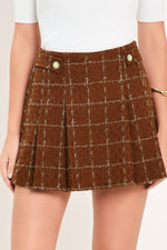 Rust plaid tweed skort with gold buttons and pleated A-line front