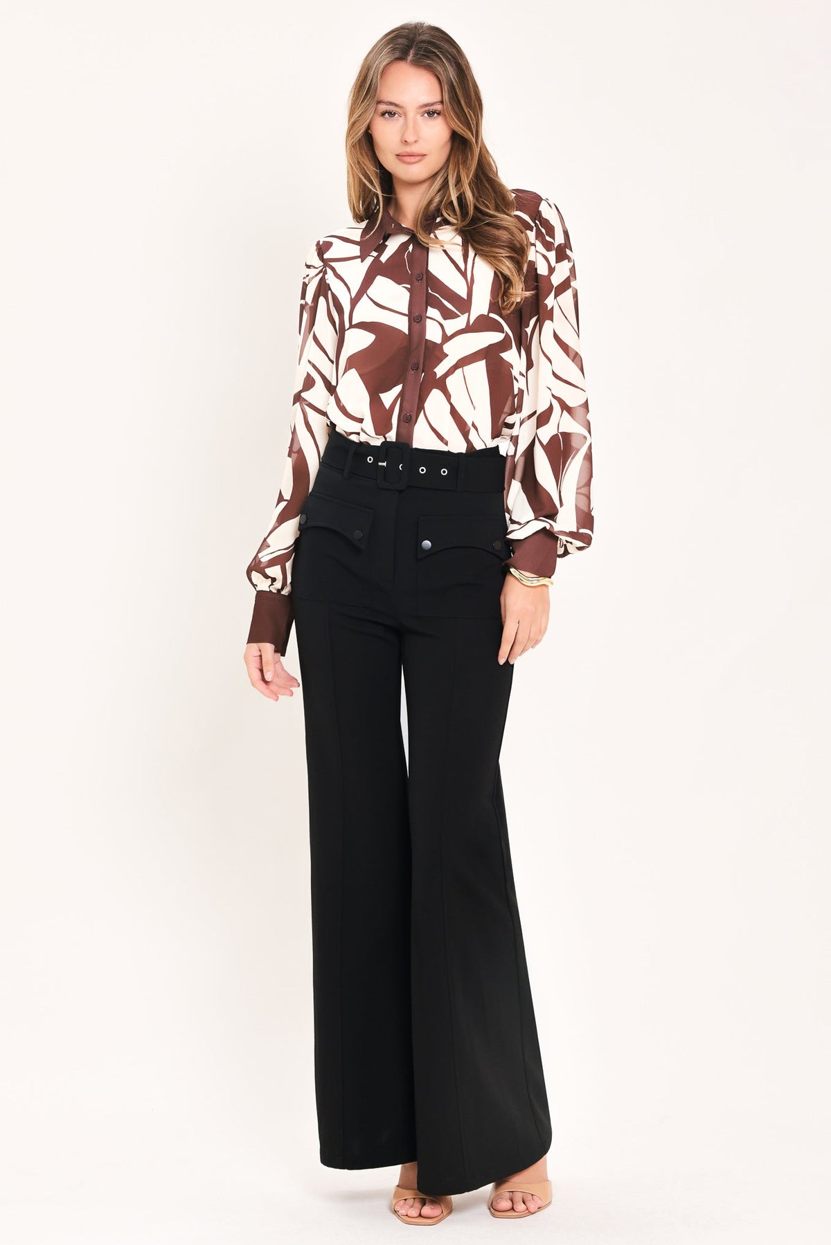 Black wide-leg pants with high waist and buttoned front pockets