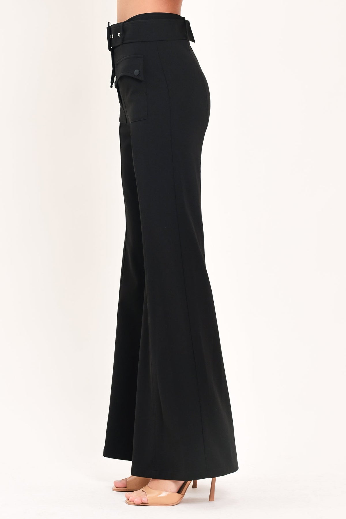 Black wide-leg pants from the back with belt loops, pocket, and flared hem