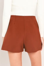 Rust Tencel skort with front center seam and structured A-line shorts shape