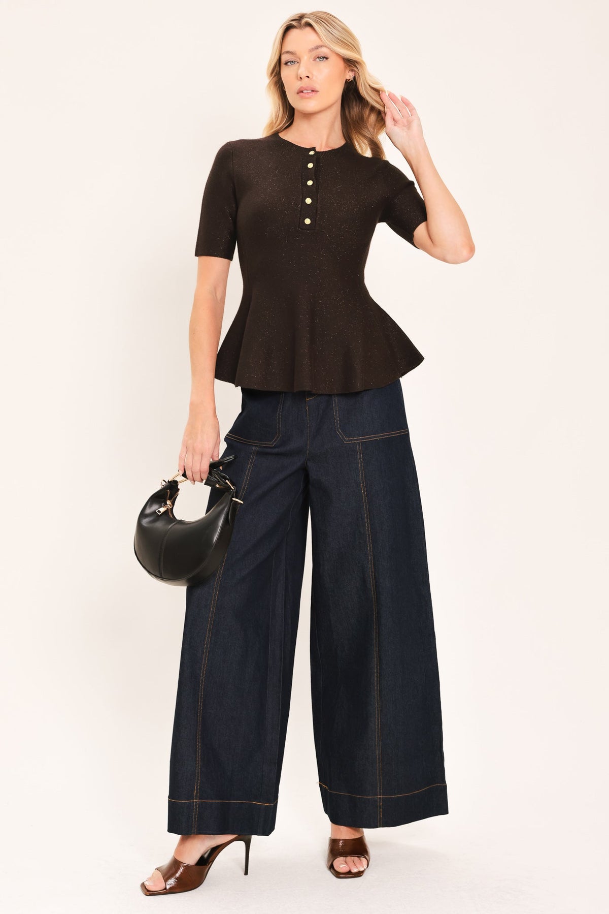 Dark brown knit peplum sweater top with short sleeves and front henley buttons