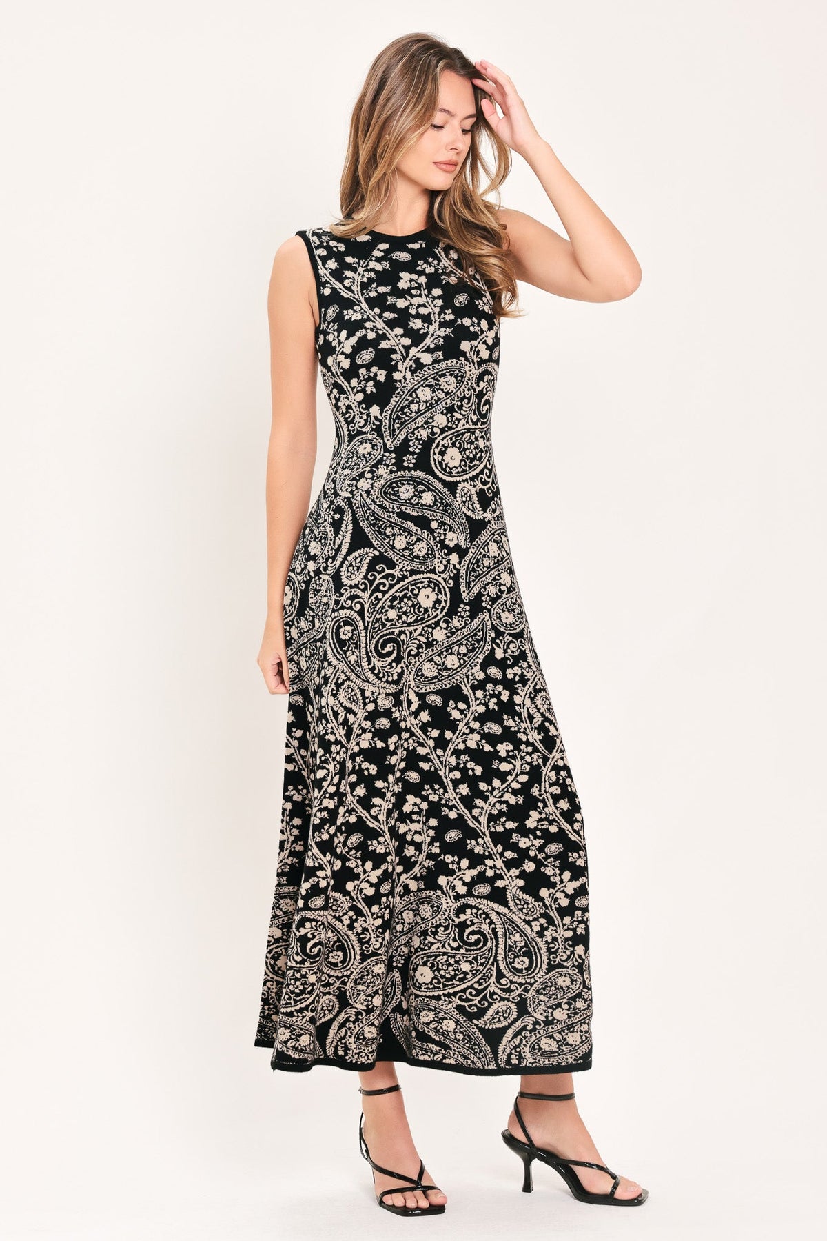 Black sleeveless midi sweater dress with paisley jacquard print and crew neck