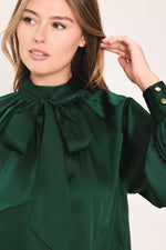 Hunter green tie-neck raglan top close-up, gathered collar bow detail