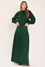 Hunter green tie-neck raglan top with loose fit and long balloon-like sleeves
