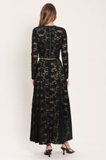 Black floral lace long-sleeve crop top, back view with vertical seam detail