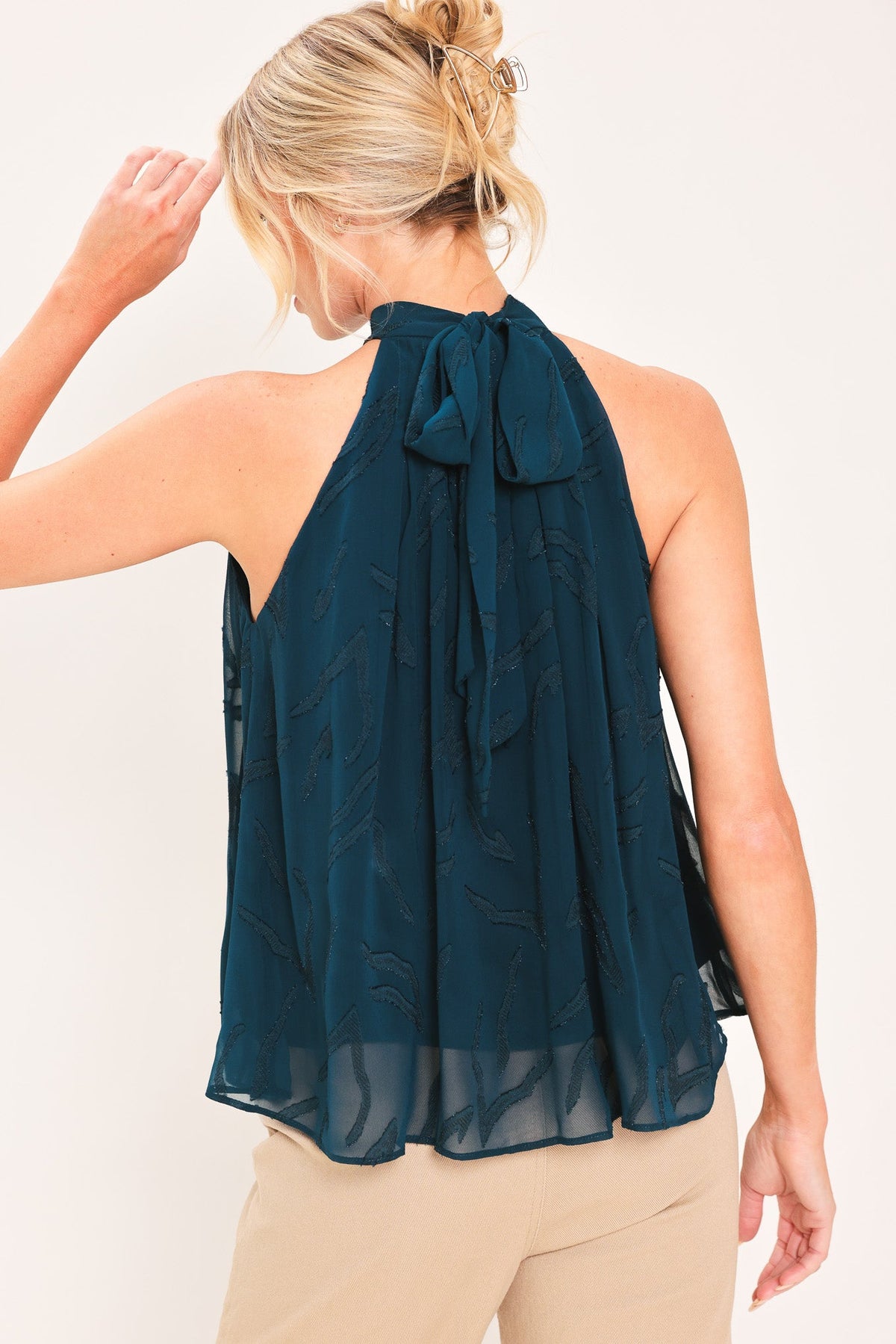 Teal sleeveless halter neck woven jacquard top with tie keyhole back detail