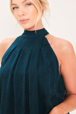 Teal halter neck woven jacquard top with high collar and subtle textured pattern