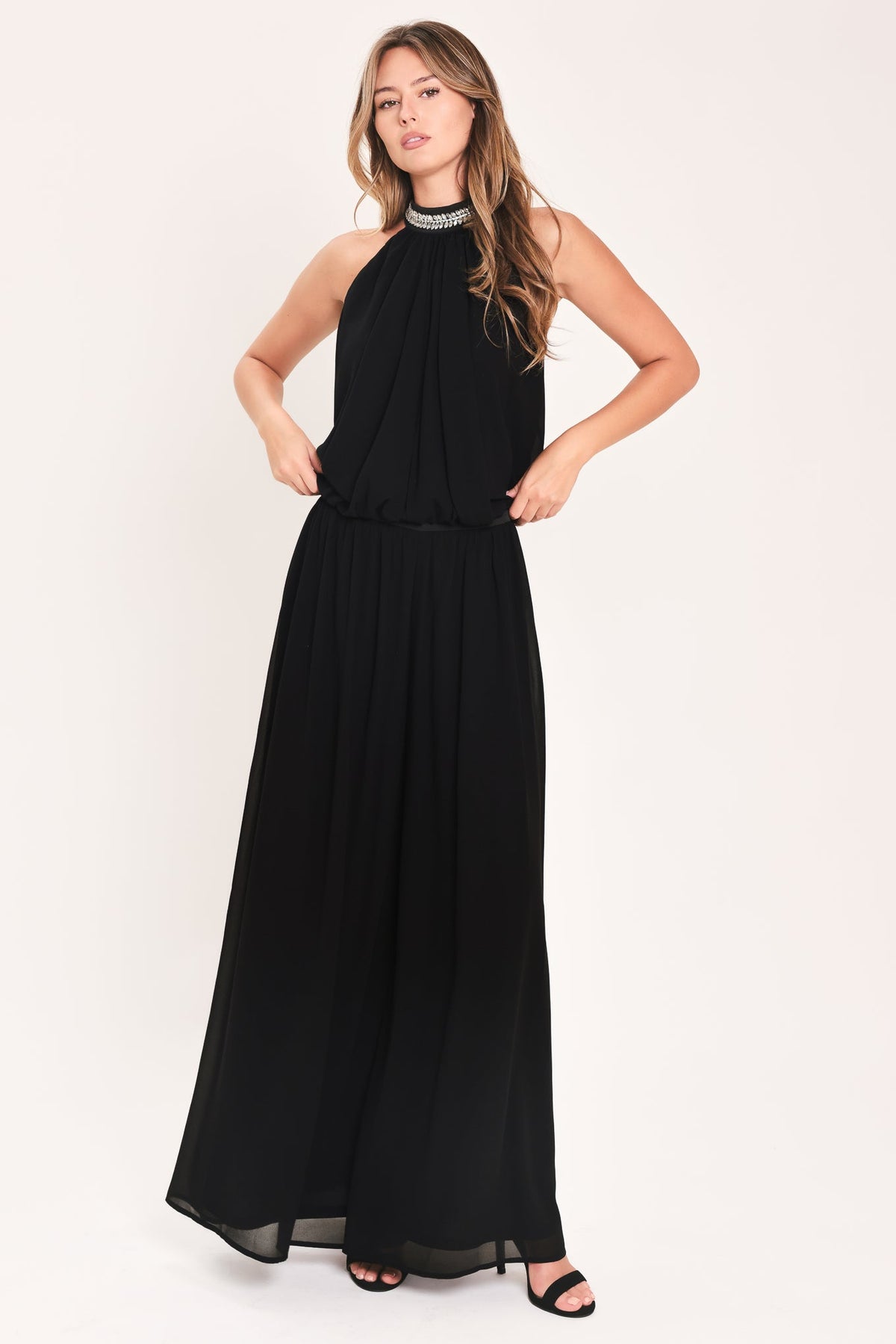 Black halter top and wide-leg pants set with rhinestone embellished neckline