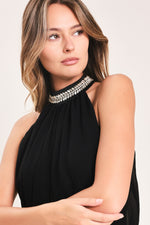 Black halter top with rhinestone embellished high neckline