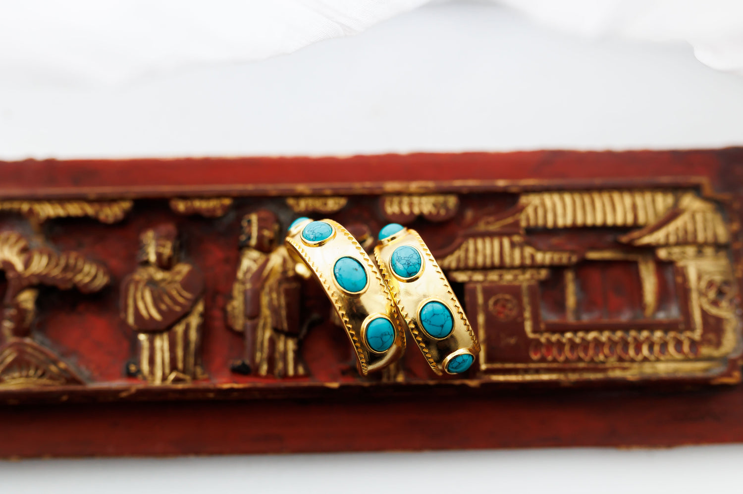 Gold-tone bracelet cuff with turquoise oval and round stones