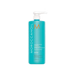 Moroccanoil Moisture Repair shampoo bottle, turquoise with white pump and back label