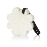 White flower-shaped body buffer sponge with black ribbon handle