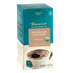 Roasted herbal tea carton with dandelion coconut label and cup of dark brewed tea