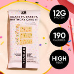 TRUBAR birthday cake protein bar with 12g protein and 190 calories badges