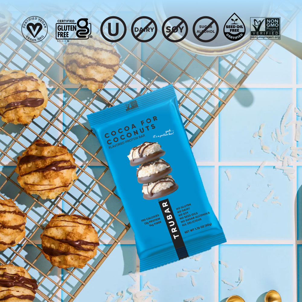 TruBar cocoa for coconuts protein bar pouch on wire rack with dietary icons
