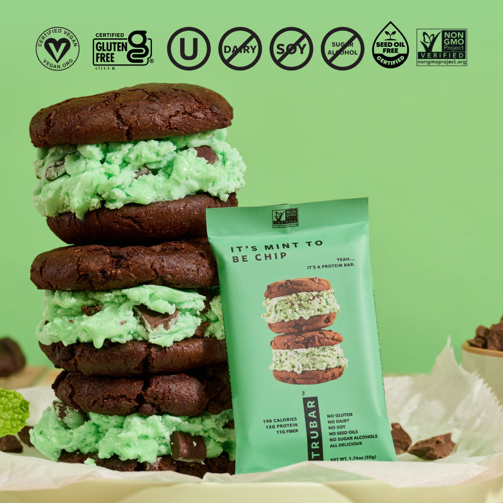 Mint filling cookie stack and mint green protein bar with dietary icons