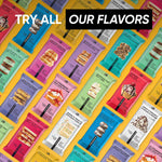 Assorted protein bars in colorful wrappers, featuring Saltylicious Almond Love