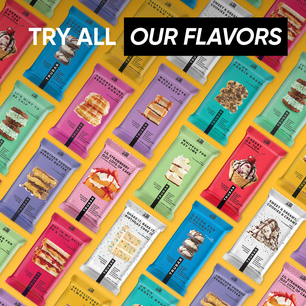 Assorted protein bars in colorful wrappers, featuring Saltylicious Almond Love