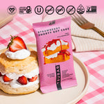 TRUBAR Strawberry Shorty Got Cake protein bar with strawberry and cashew snack on plate