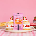 TRUBAR Strawberry Shorty Got Cake protein bar standing on plate with strawberries