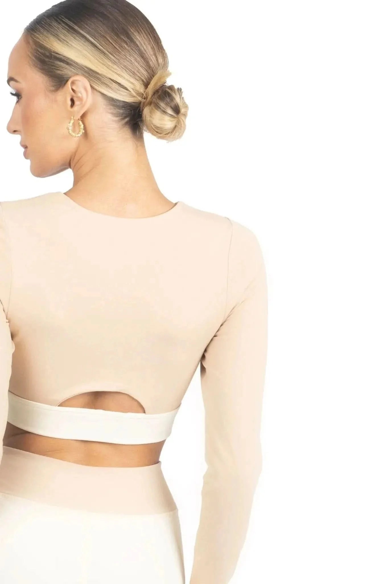 Beige long-sleeve activewear top with contrast waistband stripe detail
