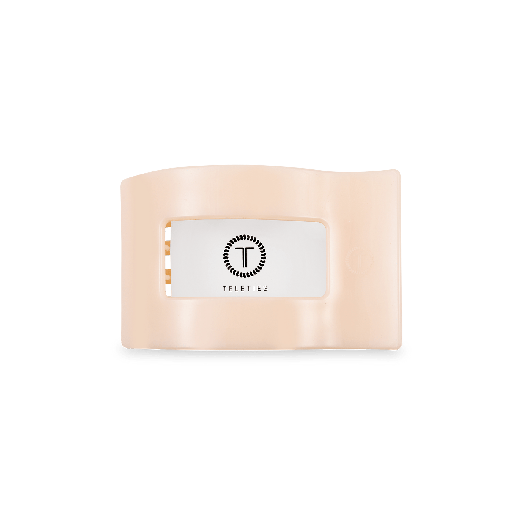 Almond beige small flat rectangle hair clip with underside logo label