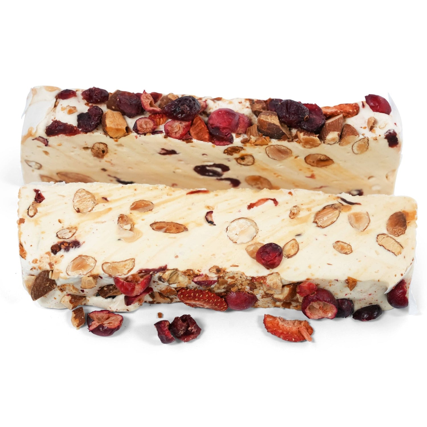 White nougat bar with sliced almonds and red fruit pieces, and fruit-speckled coating