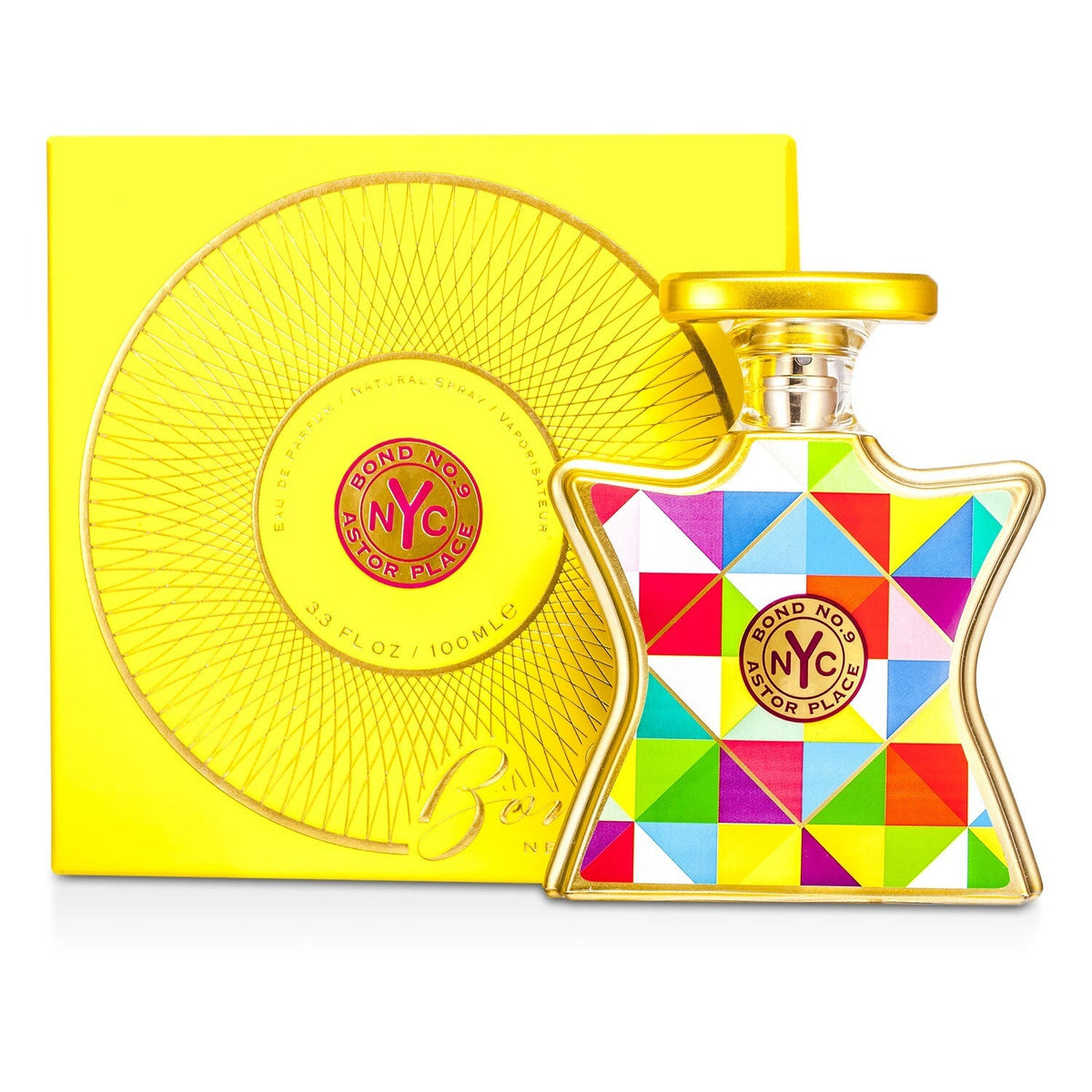 Eau de parfum bottle with geometric label, gold cap, with yellow gift box