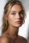 Gold-tone crystal hoop earrings with small posts