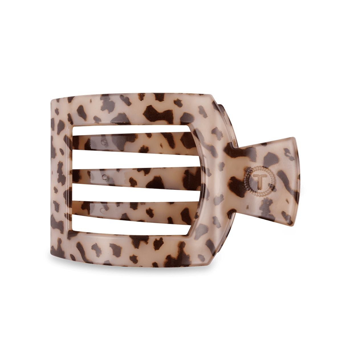 Large flat square hair clip in blonde tortoise pattern with metal T emblem