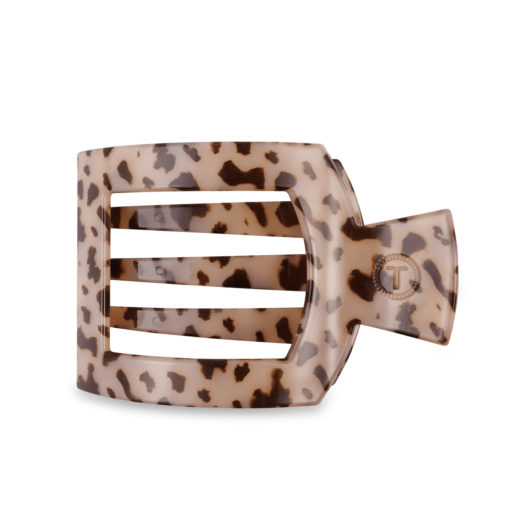 Large flat square hair clip in blonde tortoise pattern with metal T emblem