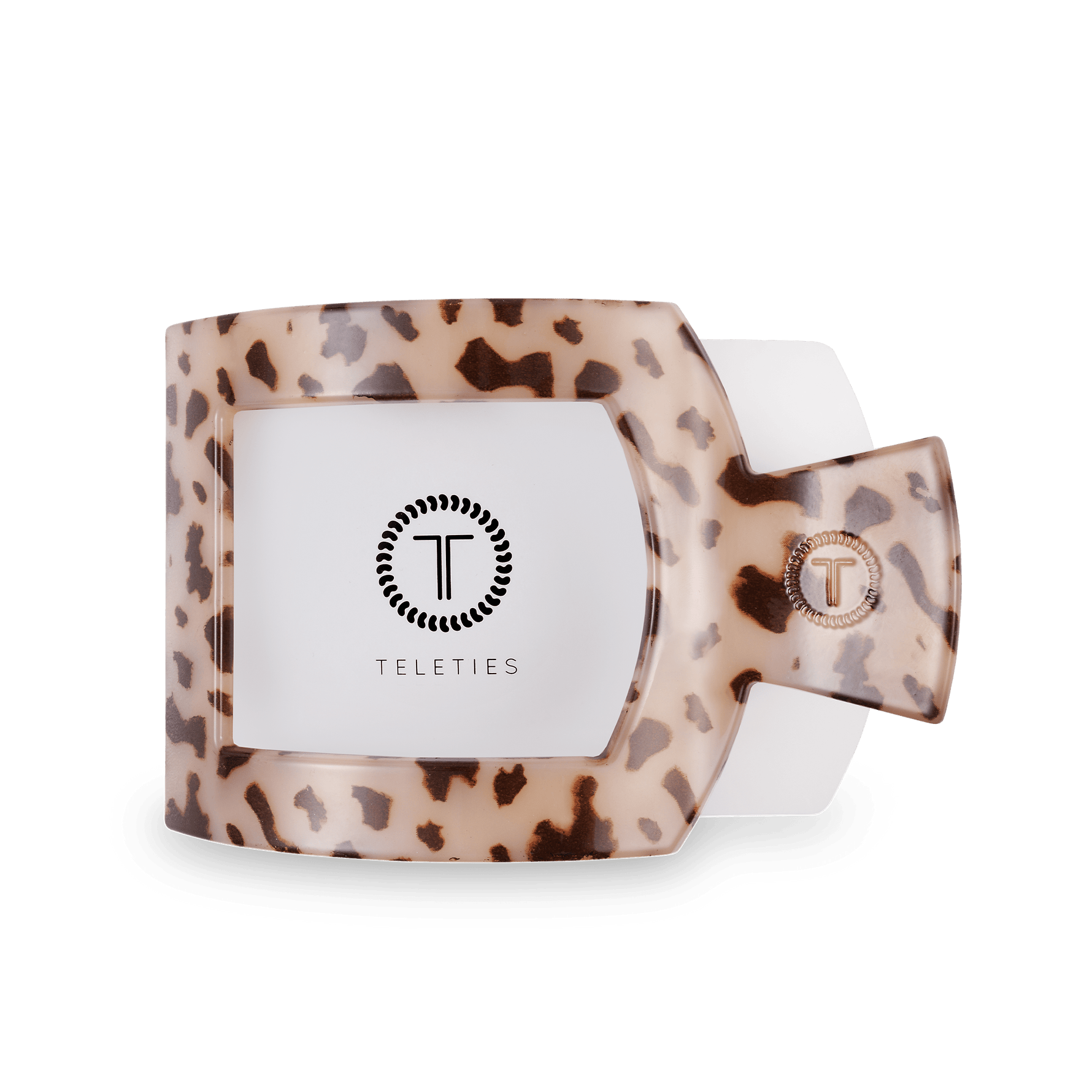 Blonde tortoise square hair clip with T logo, shown from the reverse side