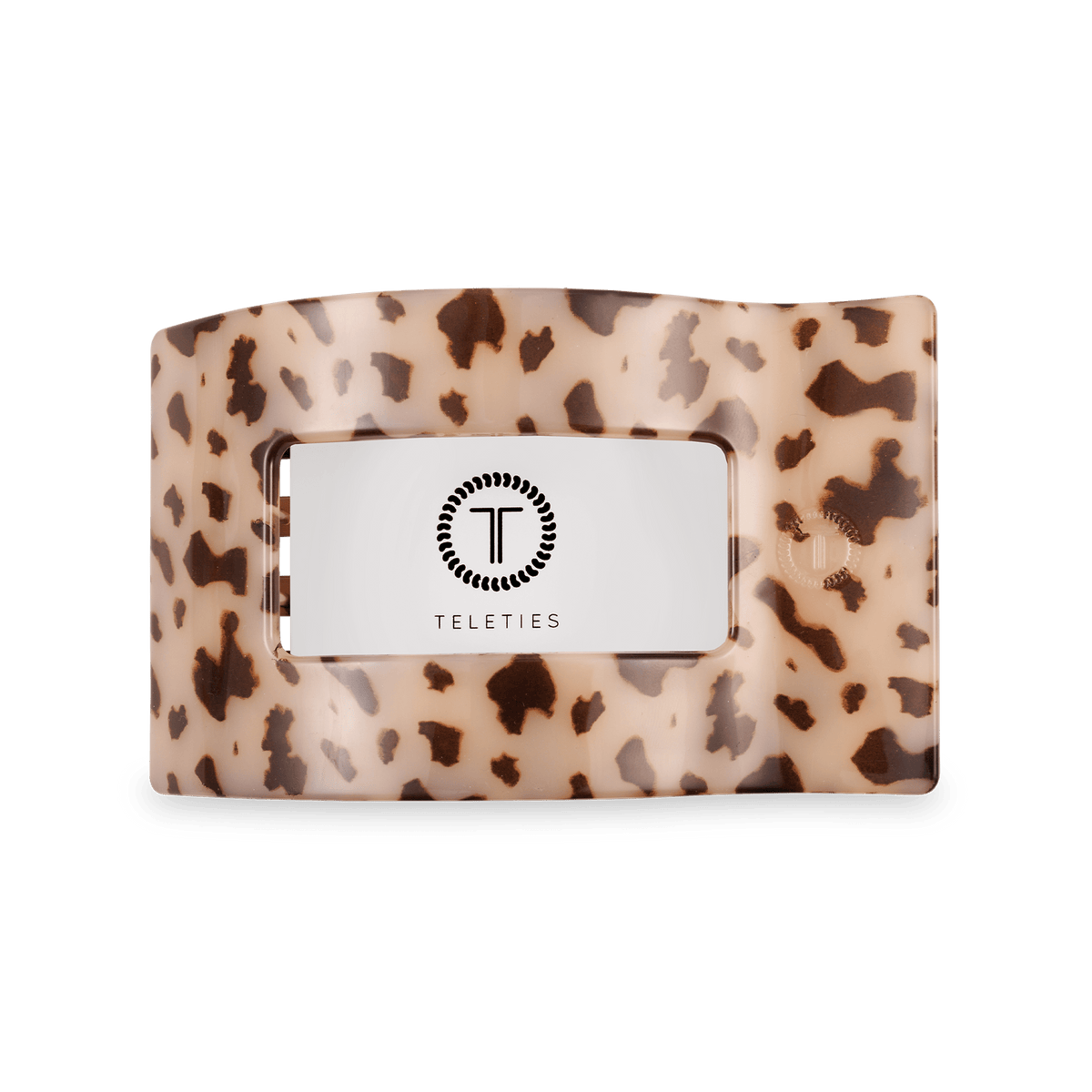 Medium flat rectangle hair clip with beige tortoise-speckled design and center logo panel
